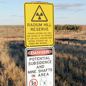 While uranium mining was halted at Radium Hill in 1961 and no more radioactive waste has been deposited there since 1998, the entire site remains a radioactive danger zone, with tailings and waste rock not properly secured from erosion and dispersion. Photo credit: South Australian Community History / creativecommons.org/licenses/by-nc-nd/2.0